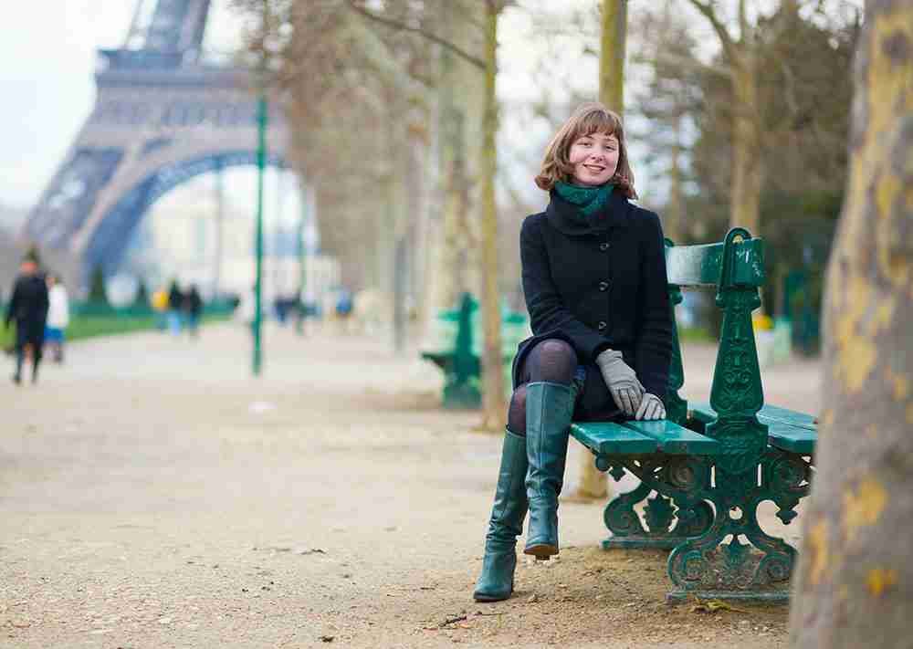 traveler eiffel in the back in paris in france